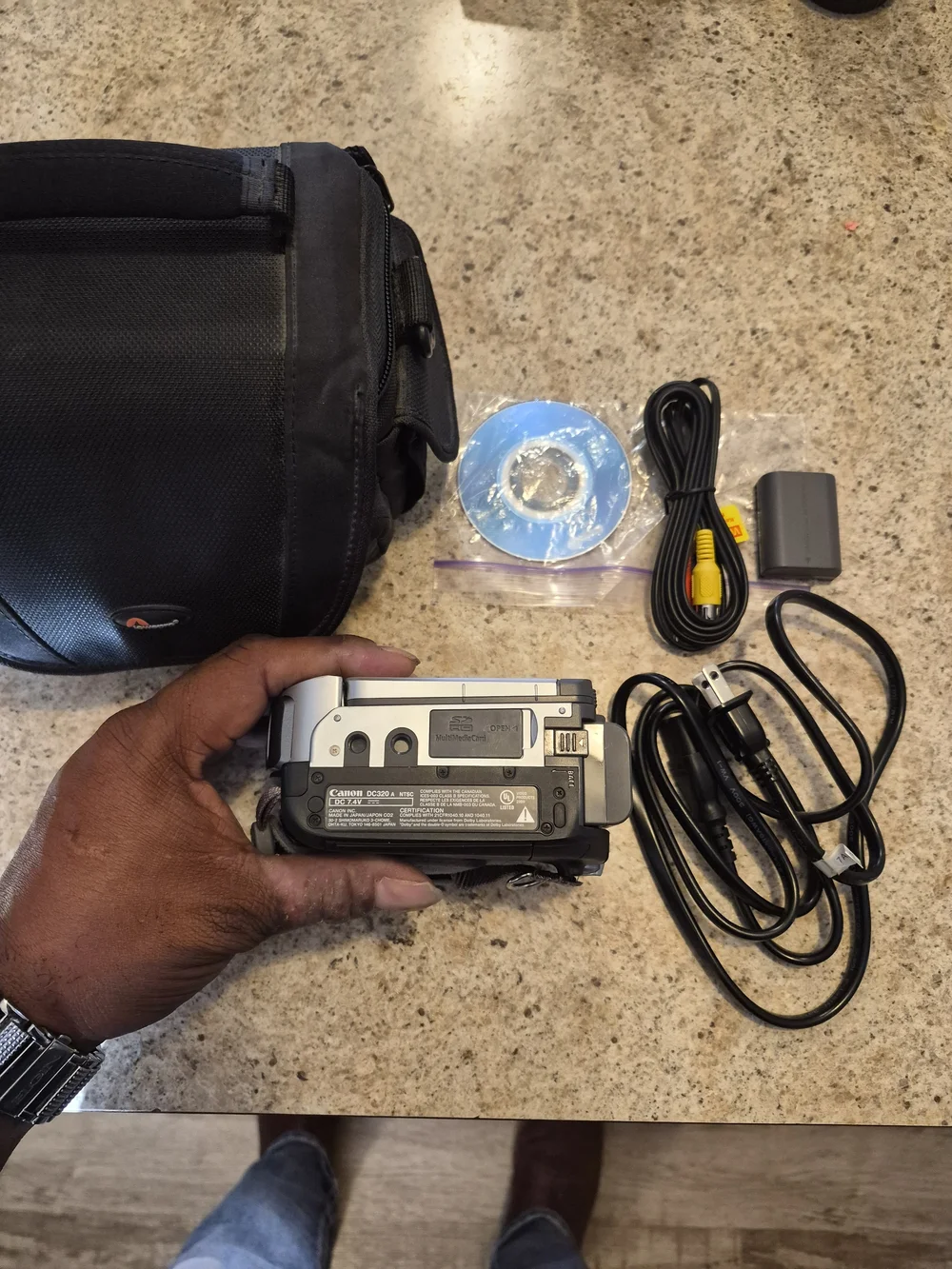 Canon Model # DC-320 Silver DVD Camcorder with Accessories